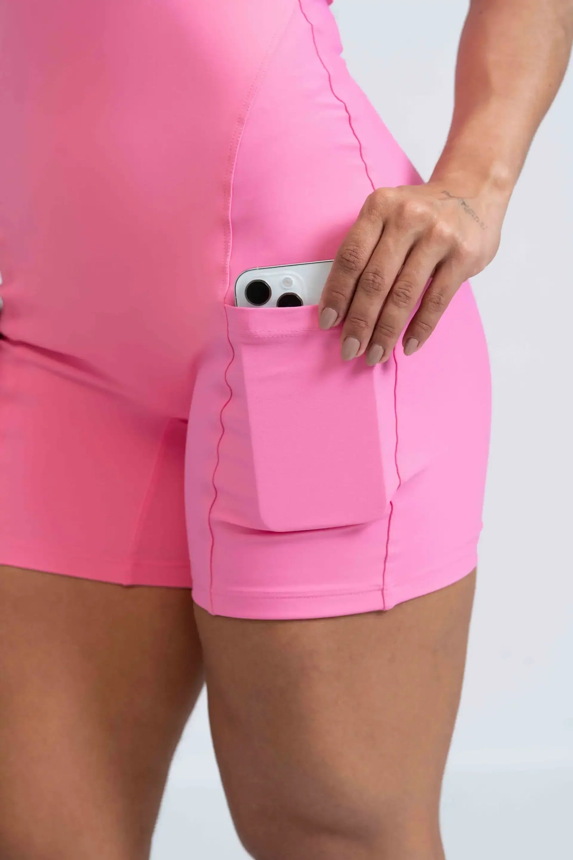 Macaquinho Fitness Flow Rosa Malibu com bolso